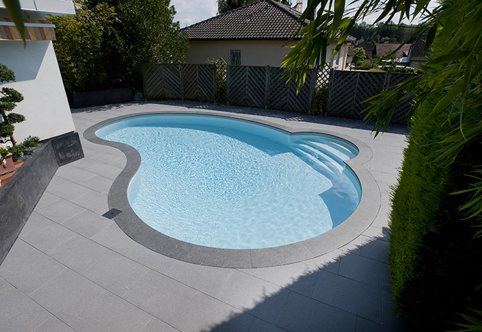 creatie van uw zwembadterras in natuursteen STONE GGILPRO in Diepenbeek, Lummen, Tielt-Winge en Bertem